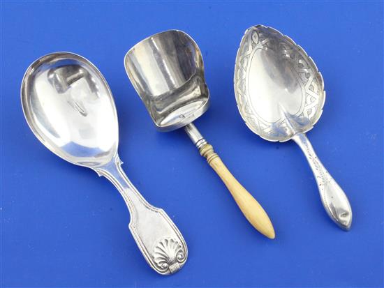 A George III ivory handled silver shovel shaped caddy spoon,
